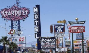 Historic Las Vegas commercial district with roadside signs and businesses, a setting where a boundary line survey can help guide sign placement