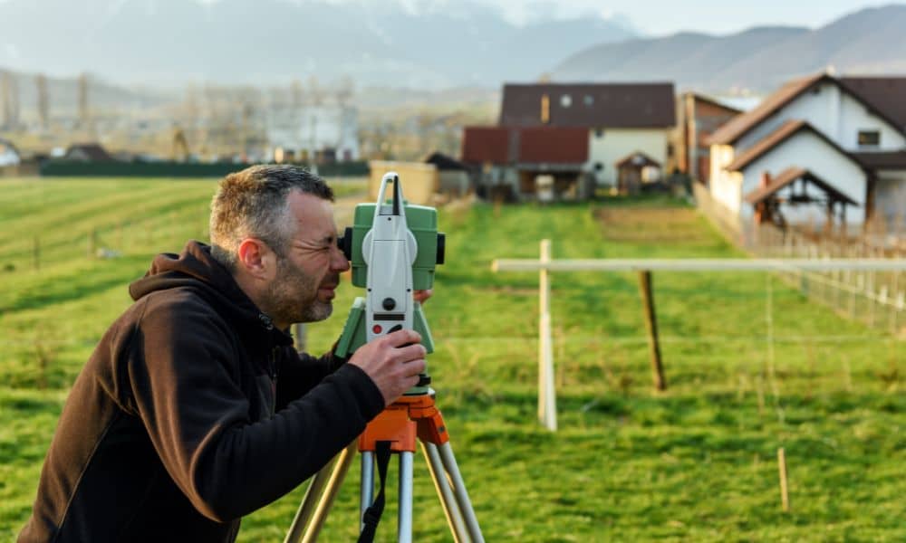 Small lot property measurement - ALTA SURVEY Nevada Land surveyor measuring a property to check lot size before building a small home