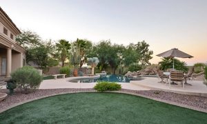 Las Vegas backyard with a pool and landscaped yard where a property line survey may be needed