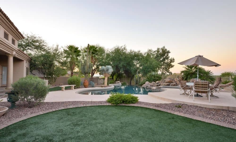 Las Vegas backyard with a pool and landscaped yard where a property line survey may be needed